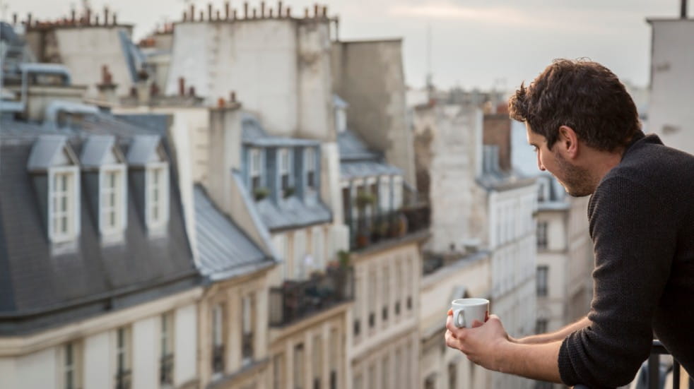 Brexit rules and regulations man standing on balcony